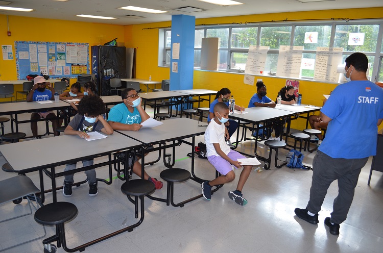 Fourth graders at the BronxWorks Classic Community Center learn about the history of the Dominican Republic during the summer of 2021.