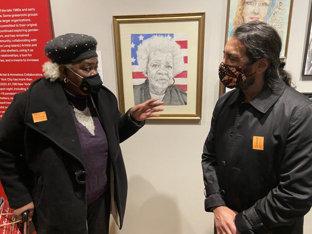 Annie W., BronxWorks Participant and Featured Artist (left), talks to Francis Palazzolo, BronxWorks Artist-in-Residence (right) about their time working together
